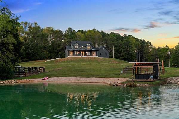 6.5 Acres of Land with Home for Sale in Riceville, Tennessee