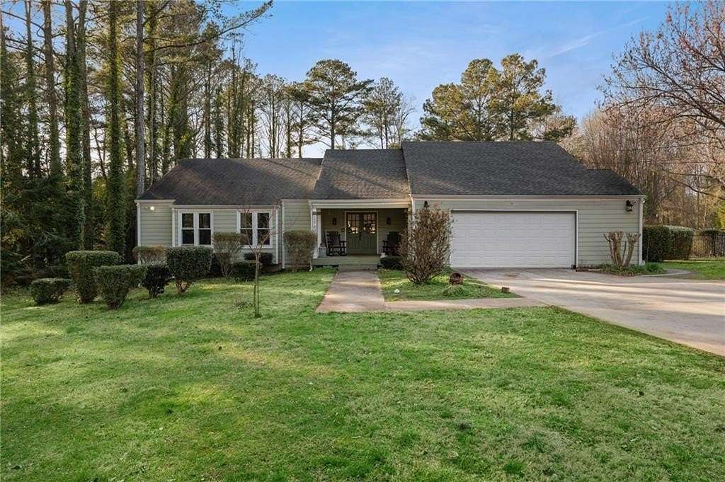 1.5 Acres of Land with Home for Sale in Alpharetta, Georgia