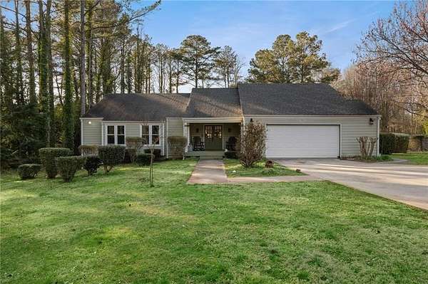 1.5 Acres of Land with Home for Sale in Alpharetta, Georgia