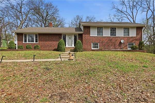 3.48 Acres of Land with Home for Sale in Oak Grove, Missouri