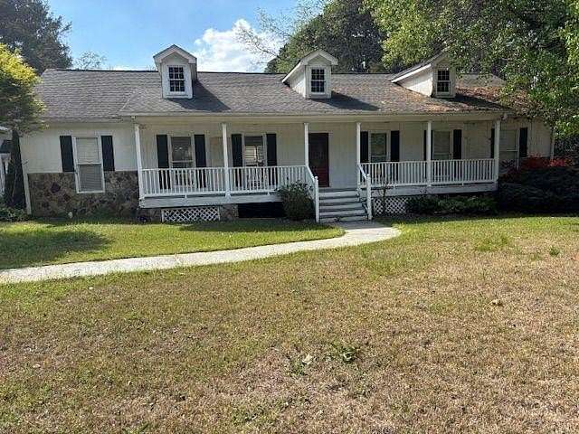 2.54 Acres of Land with Home for Sale in Lawrenceville, Georgia