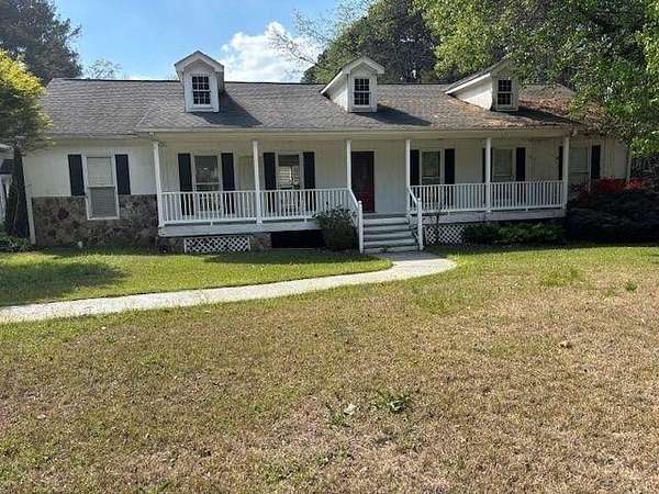 2.54 Acres of Land with Home for Sale in Lawrenceville, Georgia