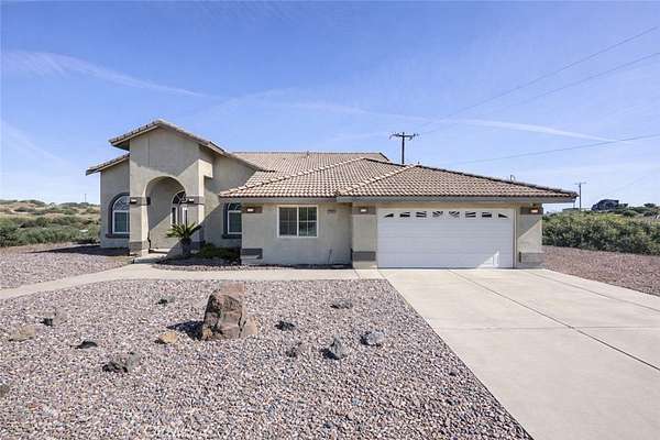 2.22 Acres of Land with Home for Sale in Oak Hills, California