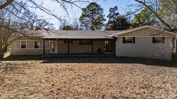 3.47 Acres of Land with Home for Sale in Mount Pleasant, Texas