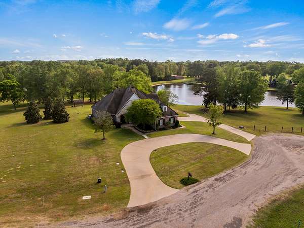 9 Acres of Land with Home for Sale in Pittsburg, Texas