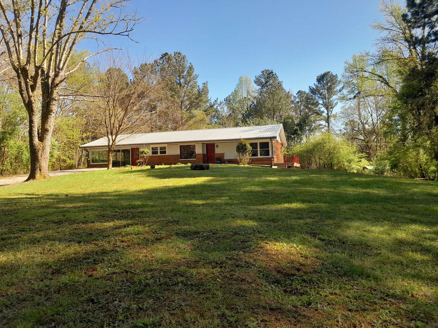 7.69 Acres of Land with Home for Sale in Copperhill, Tennessee