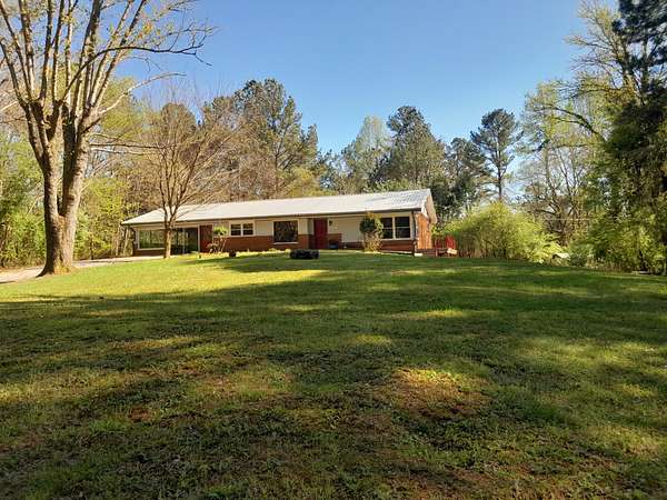 7.69 Acres of Land with Home for Sale in Copperhill, Tennessee