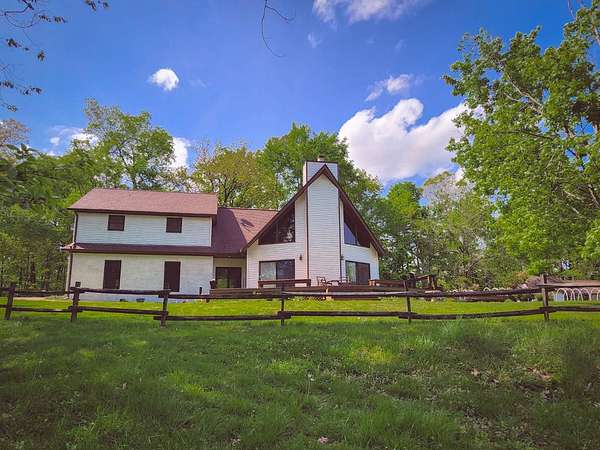 33 Acres of Land with Home for Sale in Henry, Tennessee