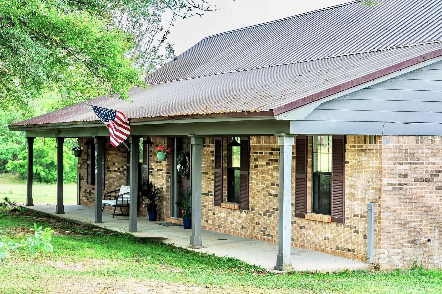 5 Acres of Land with Home for Sale in Irvington, Alabama