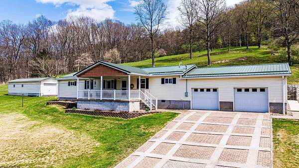 46.6 Acres of Recreational Land with Home for Sale in Fairview, West Virginia