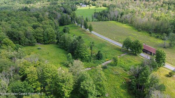 9.39 Acres of Land with Home for Sale in Prattsville, New York