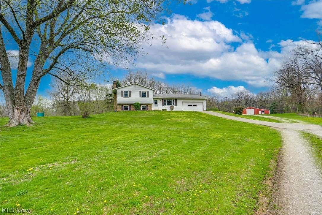 13.7 Acres of Land with Home for Sale in Canal Fulton, Ohio