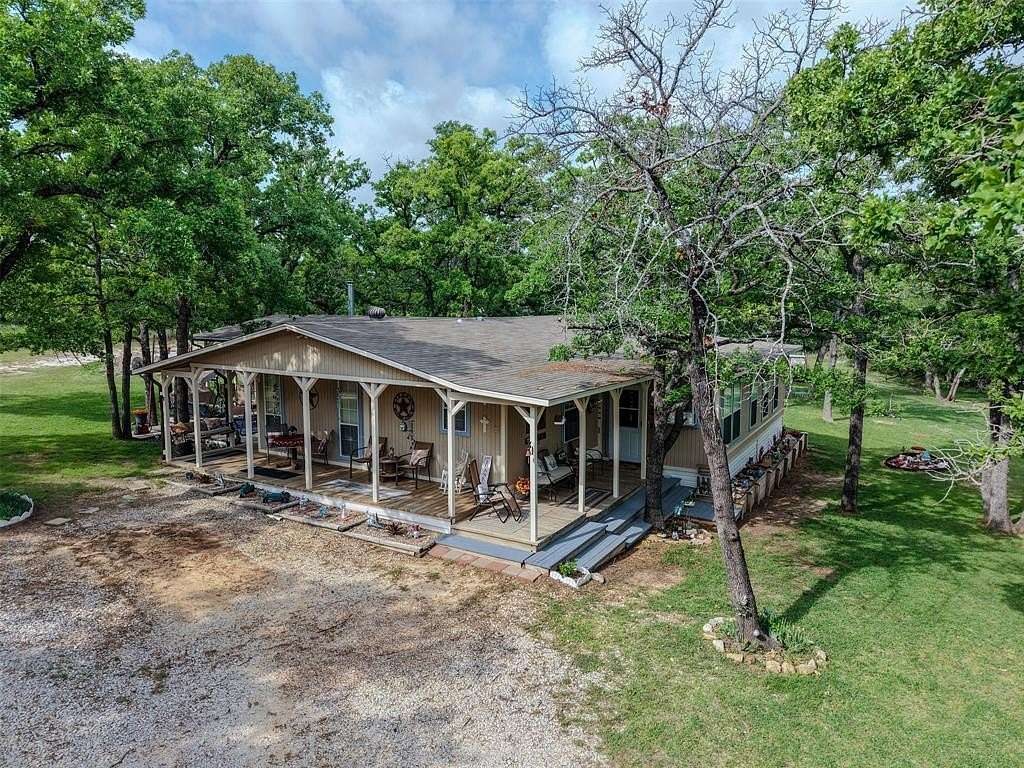 5.23 Acres of Land with Home for Sale in Springtown, Texas
