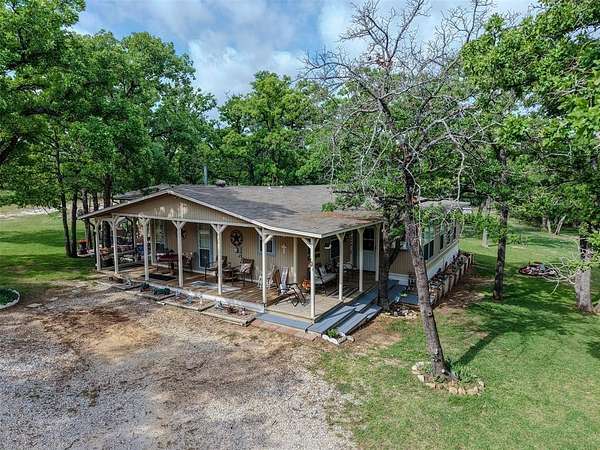 5.23 Acres of Land with Home for Sale in Springtown, Texas