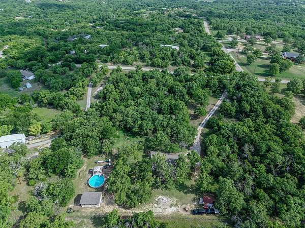 5.23 Acres of Land with Home for Sale in Springtown, Texas