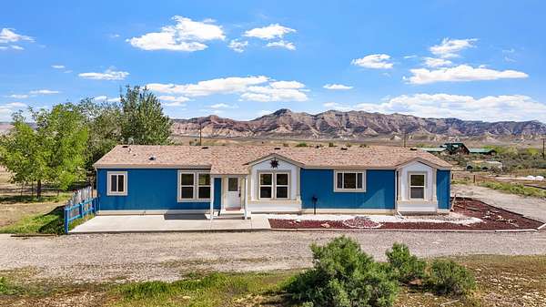 34.2 Acres of Recreational Land with Home for Sale in Loma, Colorado