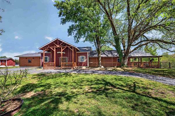 11.5 Acres of Land with Home for Sale in Sims, Arkansas