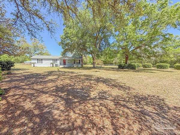 3.73 Acres of Land with Home for Sale in Milton, Florida