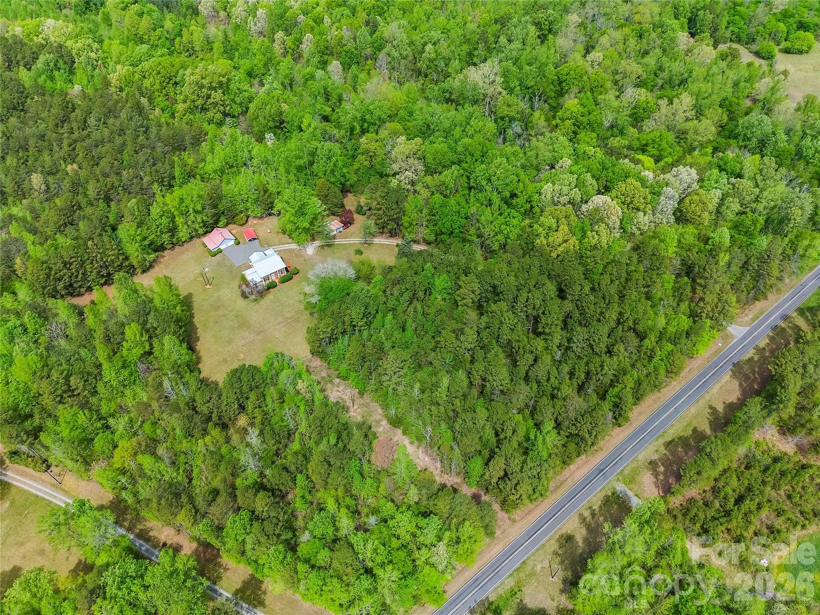 21.3 Acres of Land with Home for Sale in Midland, North Carolina