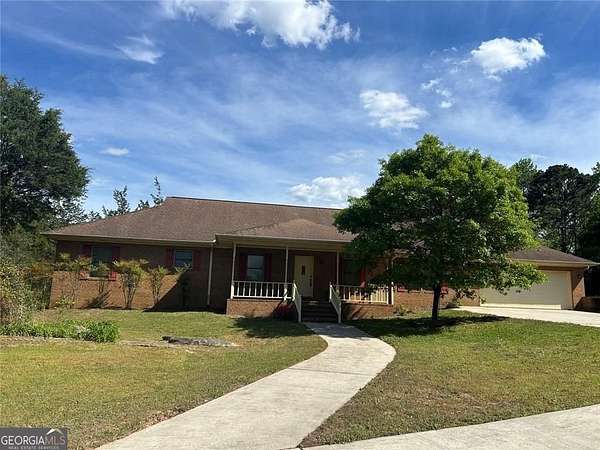 3.5 Acres of Land with Home for Sale in Lithonia, Georgia