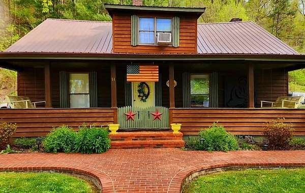 5.4 Acres of Land with Home for Sale in Salyersville, Kentucky