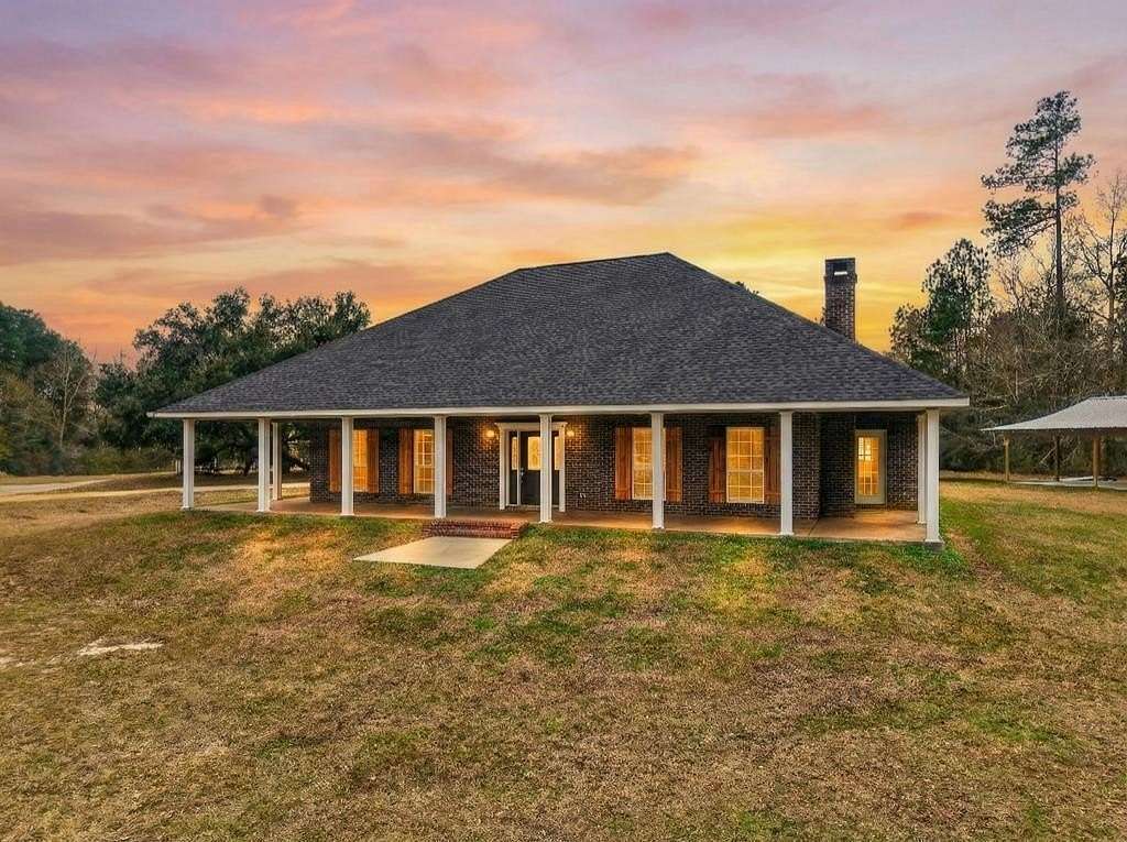 11.4 Acres of Land with Home for Sale in Carriere, Mississippi