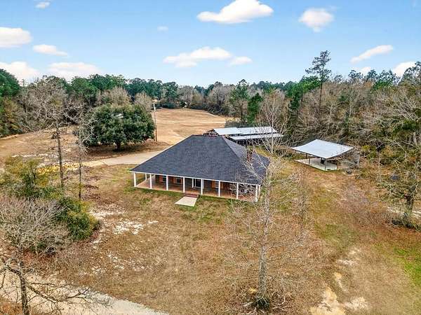 11.4 Acres of Land with Home for Sale in Carriere, Mississippi
