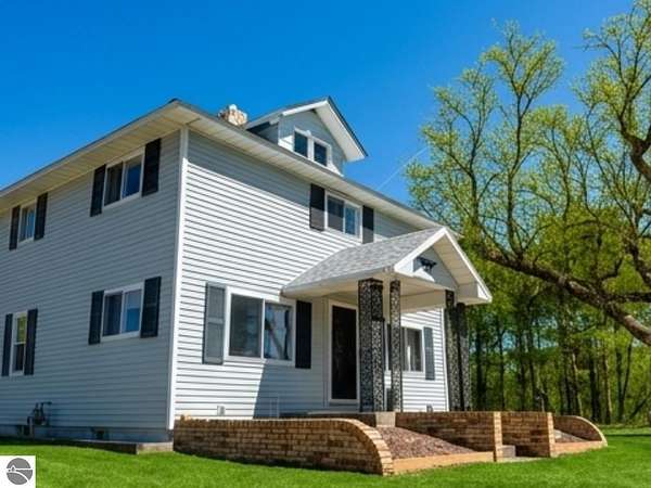 10 Acres of Land with Home for Sale in Lake City, Michigan