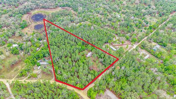 6.89 Acres of Land with Home for Sale in Melrose, Florida