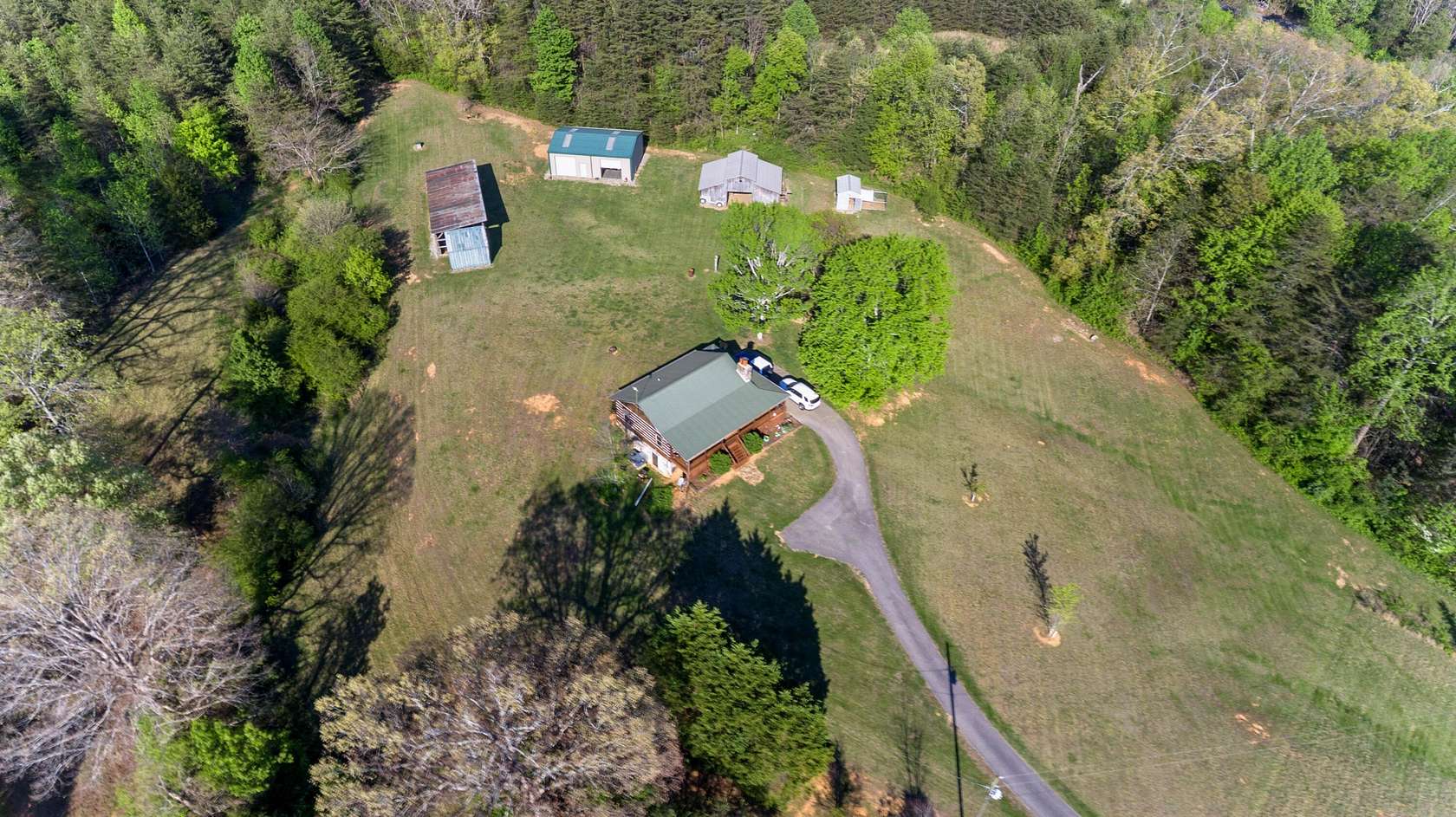 5.73 Acres of Land with Home for Sale in Madisonville, Tennessee
