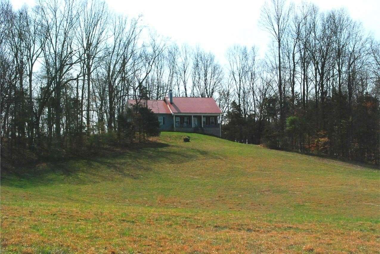 48.8 Acres of Agricultural Land with Home for Sale in Scottsville, Kentucky