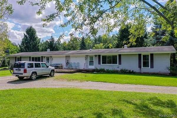 1.9 Acres of Land with Home for Sale in Oceola Township, Michigan