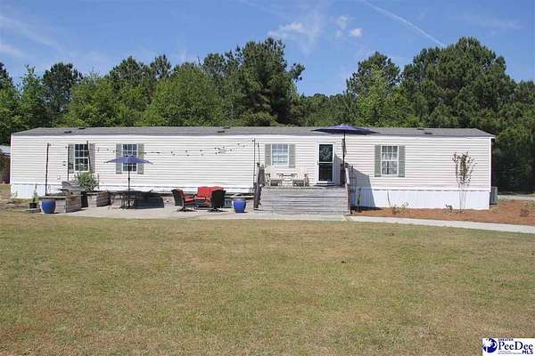 28 Acres of Land with Home for Sale in Lamar, South Carolina