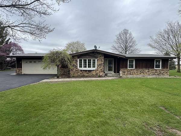 5.8 Acres of Land with Home for Auction in Monroe, Indiana