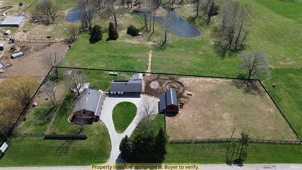 1.84 Acres of Land with Home for Auction in Shipshewana, Indiana