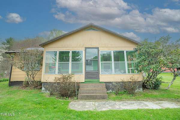 5.2 Acres of Land with Home for Sale in Roan Mountain, Tennessee