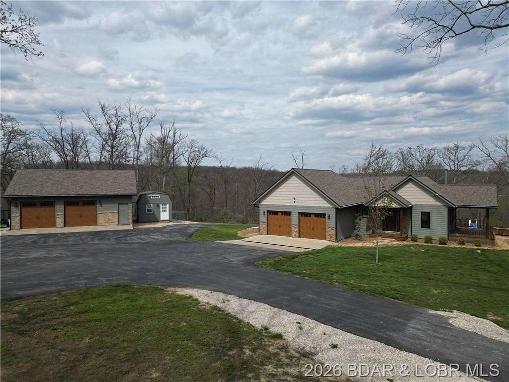 75 Acres of Recreational Land with Home for Sale in Stover, Missouri
