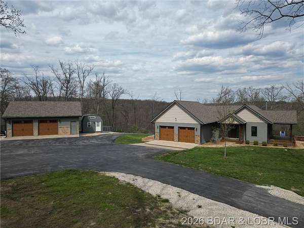 75 Acres of Recreational Land with Home for Sale in Stover, Missouri