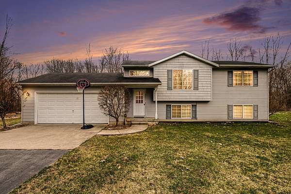 2 Acres of Land with Home for Sale in Cedar Springs, Michigan