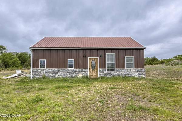 37 Acres of Recreational Land with Home for Sale in Baxter Springs, Kansas