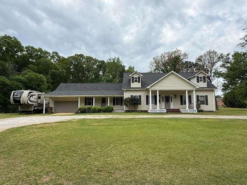 2 Acres of Land with Home for Sale in Fulton, Mississippi