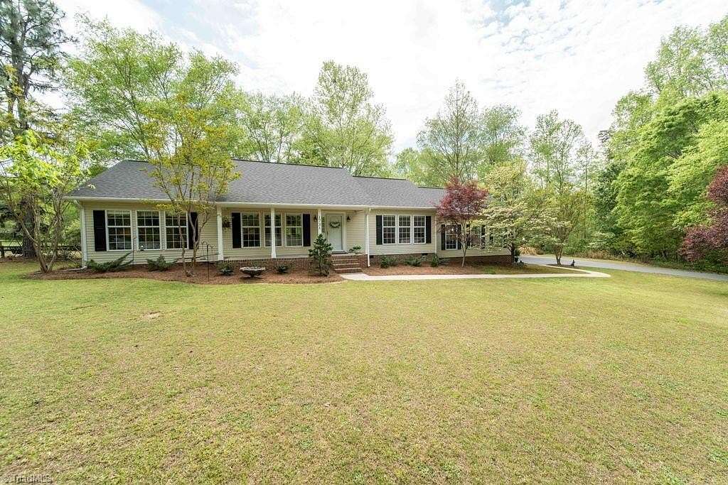 2.67 Acres of Land with Home for Sale in Colfax, North Carolina