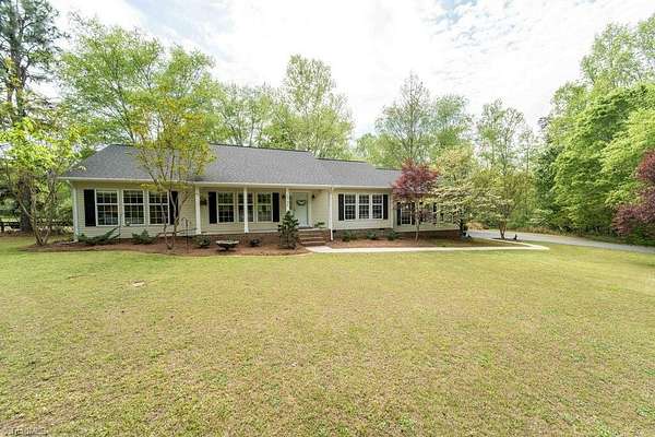 2.67 Acres of Land with Home for Sale in Colfax, North Carolina