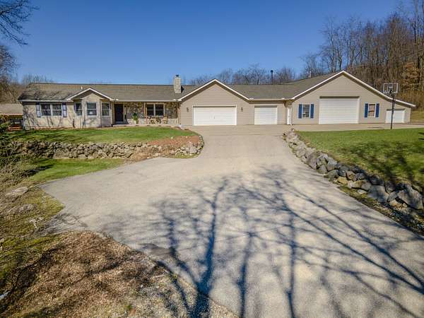 10 Acres of Recreational Land with Home for Sale in Lowell, Michigan