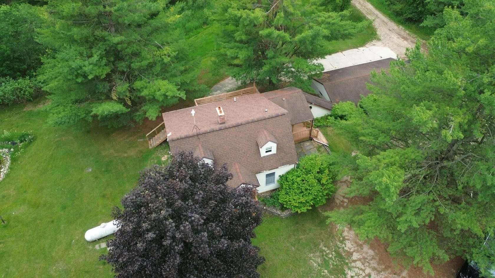 5 Acres of Land with Home for Sale in Evart, Michigan