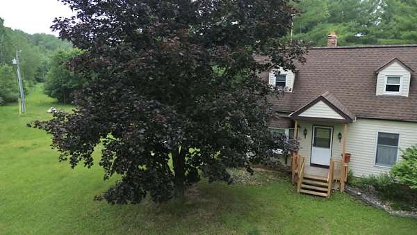 3 Acres of Land with Home for Sale in Evart, Michigan