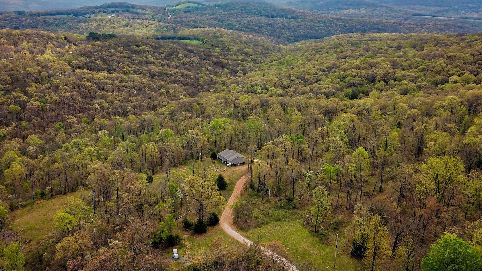 30.4 Acres of Recreational Land with Home for Sale in West Fork, Arkansas