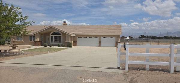 2.3 Acres of Land with Home for Lease in Oak Hills, California