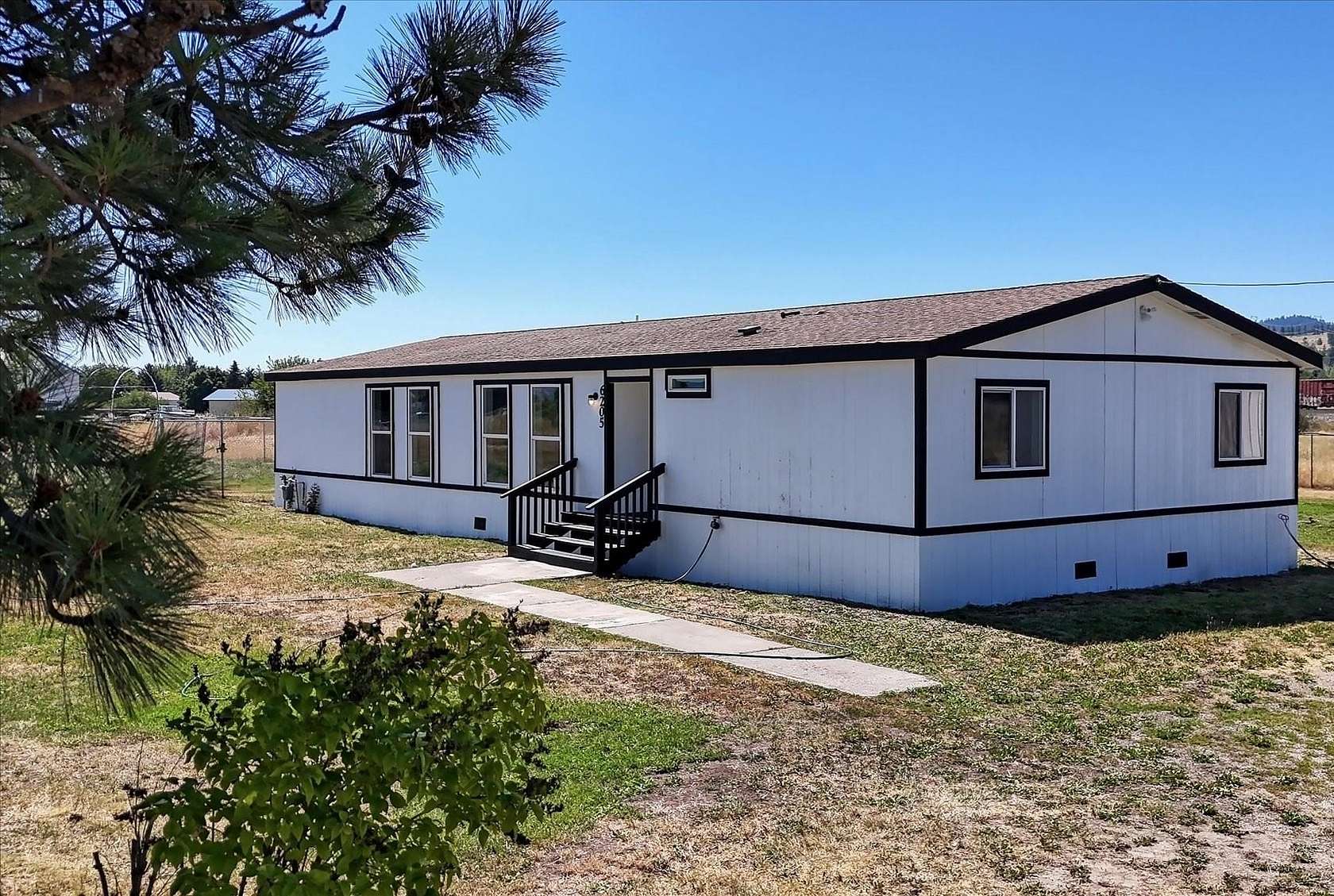 5 Acres of Land with Home for Sale in Otis Orchards, Washington