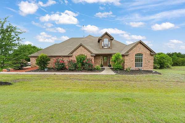 1.75 Acres of Land with Home for Sale in Cresson, Texas